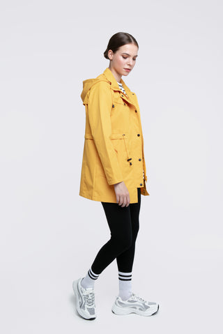 Bright yellow Elle Festival short parka, perfect for adding a pop of Colour to your outfit while keeping you Cosy.