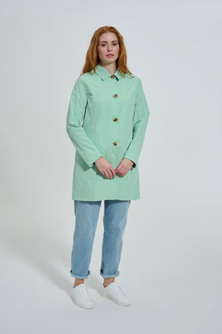Mint green single-breasted mac coat by Elle Jennifer, perfect for a stylish and casual look.
