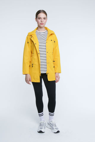 Stylish yellow short parka from Elle Festival, ideal for layering and staying warm during chilly outings.