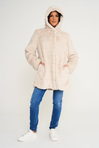 Cosy cream hooded faux fur coat for ladies, blending style and warmth effortlessly.