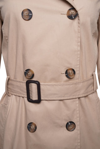 Elle Tina's double-breasted trench coat in stone, combining elegance and comfort for a timeless wardrobe staple.