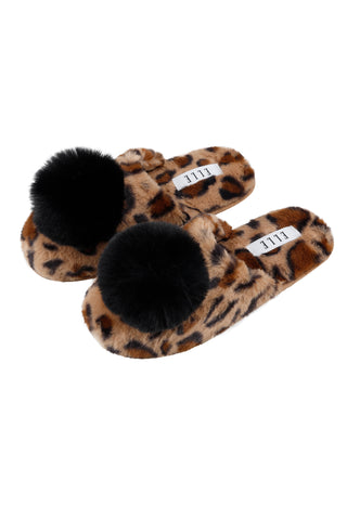 Cosy leopard print faux fur slippers, perfect for lounging at home in style and comfort. 