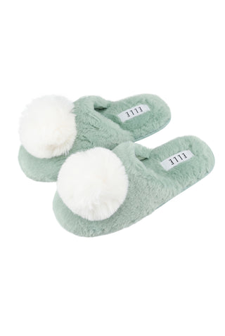 Cosy mint faux fur slippers, perfect for keeping your feet warm and stylish at home. 