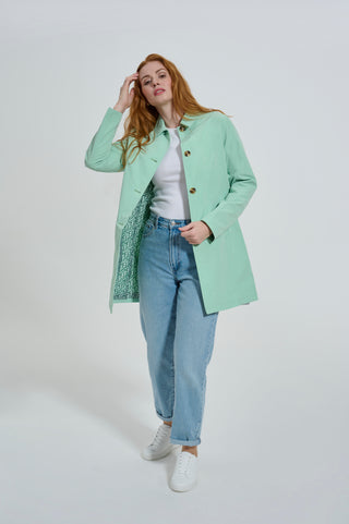 Stylish mint green mac coat by Elle Jennifer, featuring a single-breasted design for a trendy vibe.