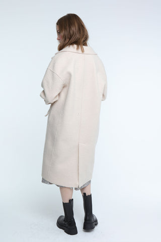 Trendy blue double-breasted long coat, a must-have for a polished look in cooler weather.