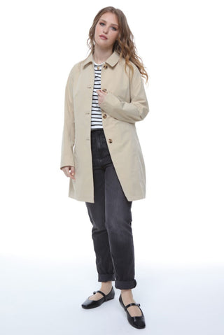 Classic ivory mac coat by Elle Jennifer, single-breasted design that effortlessly elevates your wardrobe.