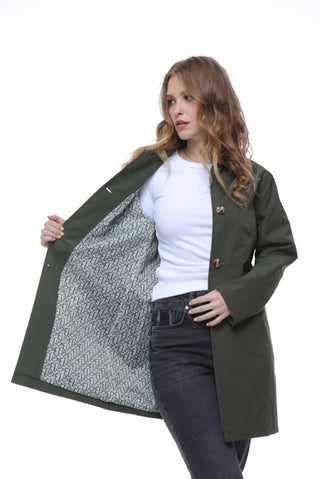 A trendy green mac coat from Elle Jennifer, showcasing a single-breasted style for a fresh and fashionable vibe.