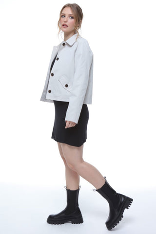 Chic ivory cream cropped mac by Elle Zoe, ideal for a fashionable layer that complements any casual or dressy outfit.  